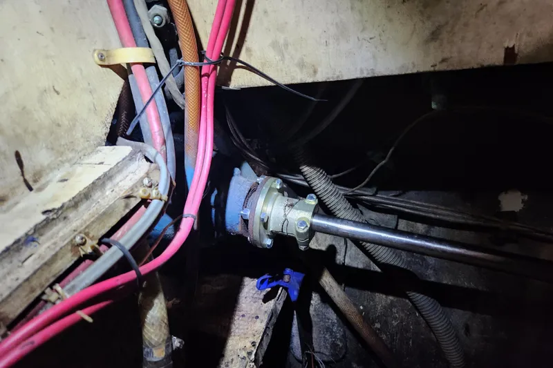 Slide: The Image of 1979 Morgan 45 Ketch engine compartment with visible wiring and mechanical components. - 85