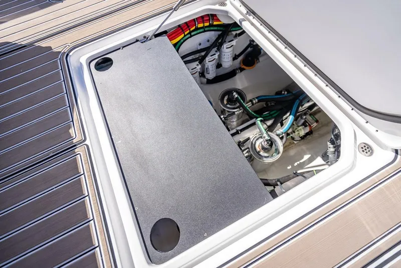 Slide: The Image of 2023 Nor-Tech 500 Sport engine compartment with visible components and wiring. - 38