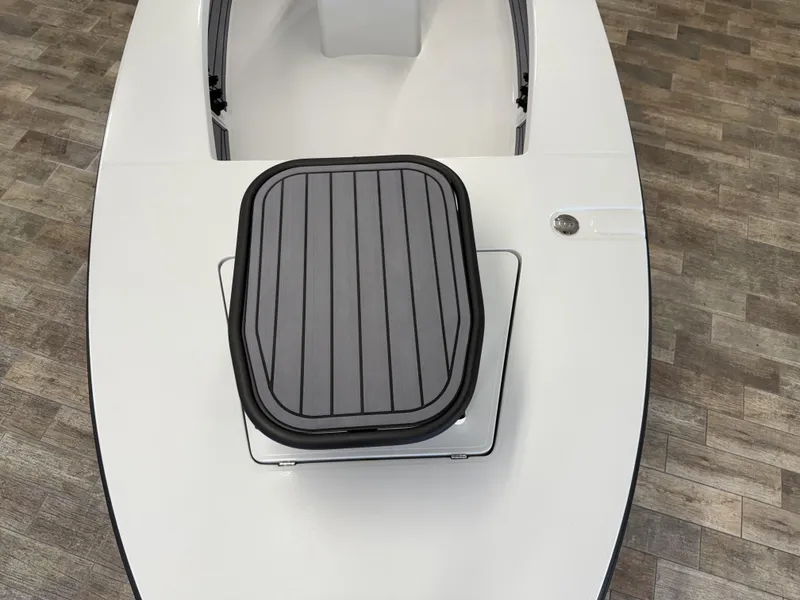 Slide: The Image of 2025 Maverick 18 HPX-V boat deck with hatch, featuring sleek design and wood-patterned flooring. - 10