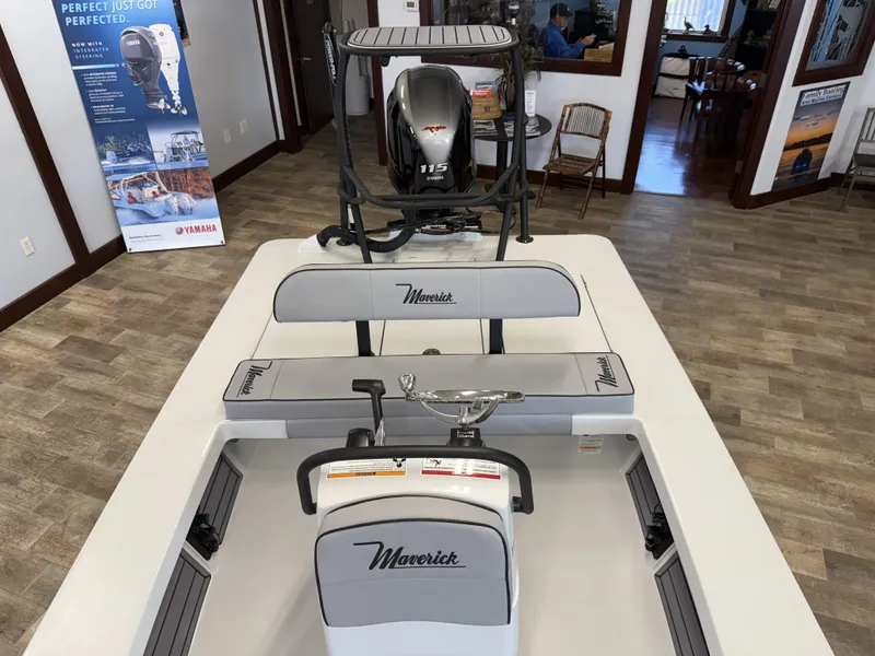 Slide: The Image of 2025 Maverick 18 HPX-V boat interior with Yamaha engine, showroom display. - 11