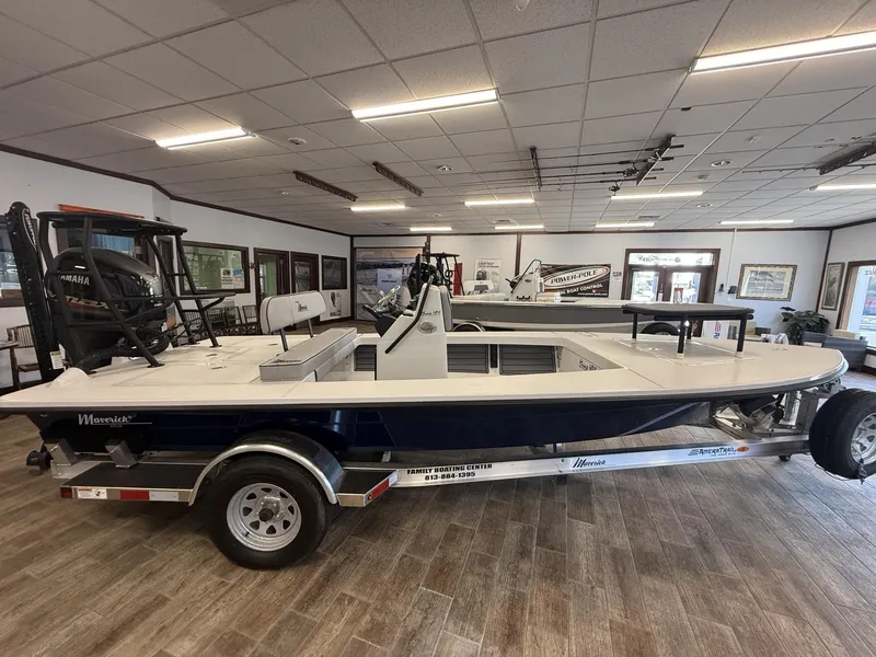 Slide: The Image of 2025 Maverick 18 HPX-V boat displayed indoors on a trailer. - 14