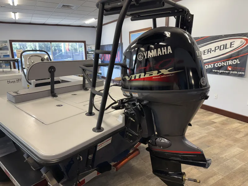 Slide: The Image of 2025 Maverick 18 HPX-V boat with Yamaha VMAX engine in showroom. - 16