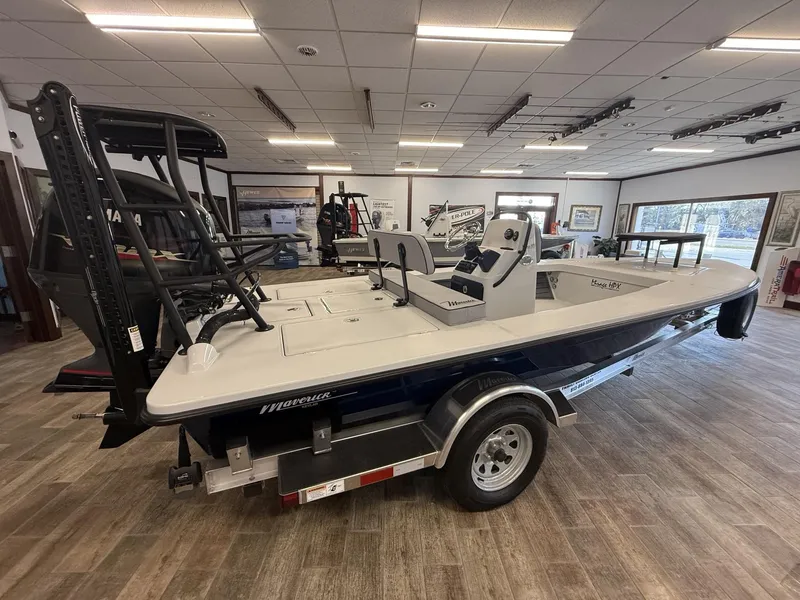 Slide: The Image of 2025 Maverick 18 HPX-V boat displayed indoors on a trailer. - 2