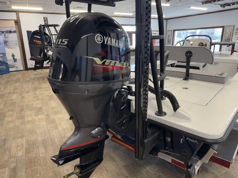 Slide: The Image of 2025 Maverick 18 HPX-V boat with Yamaha VMAX 115 outboard motor in showroom. - 4