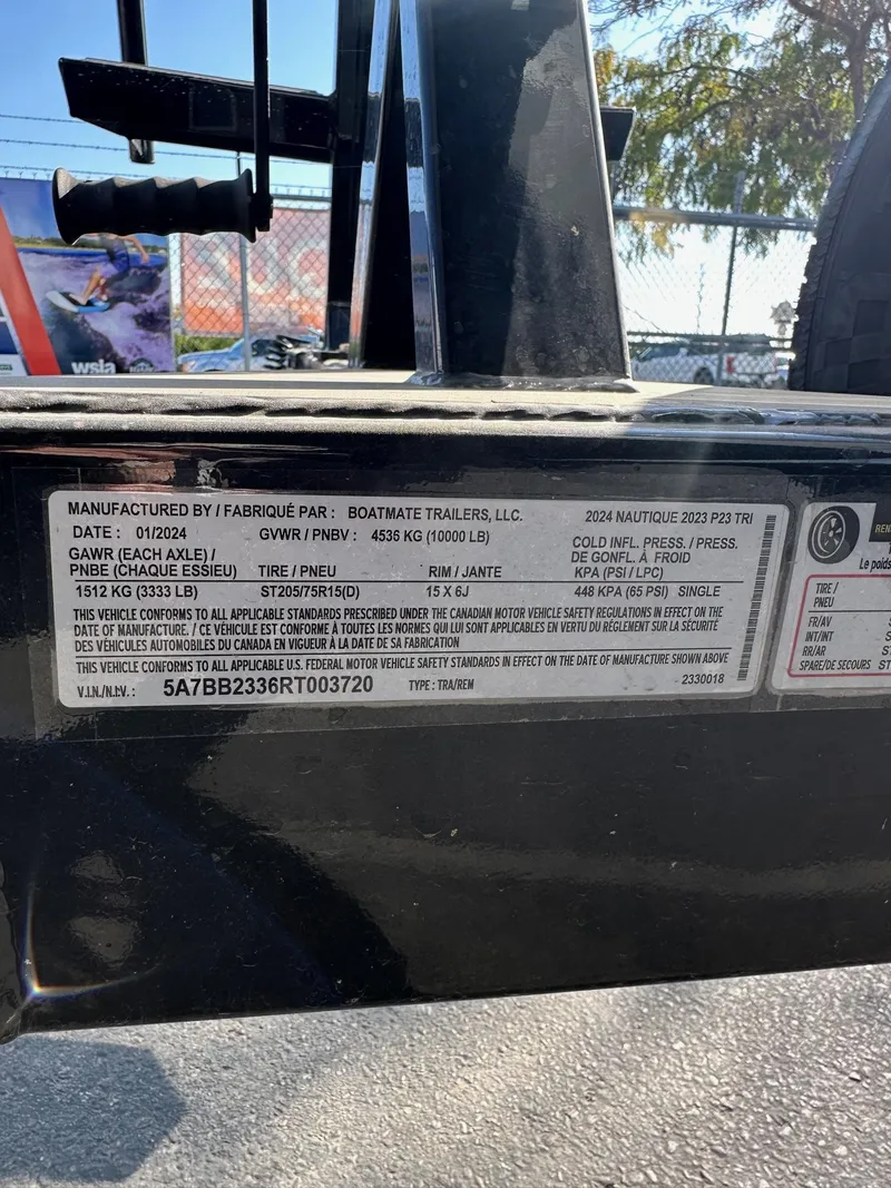 Slide: The Image of Label on 2023 Nautique PARAGON 23 trailer, detailing specifications and compliance information. - 24