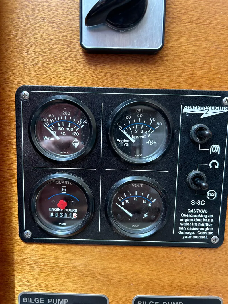Slide: The Image of Control panel of a 1996 Mast & Mallet 34 Rabbit Custom boat. - 31