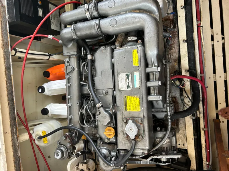 Slide: The Image of Engine of a 1996 Mast & Mallet 34 Rabbit Custom boat, showing detailed components. - 37