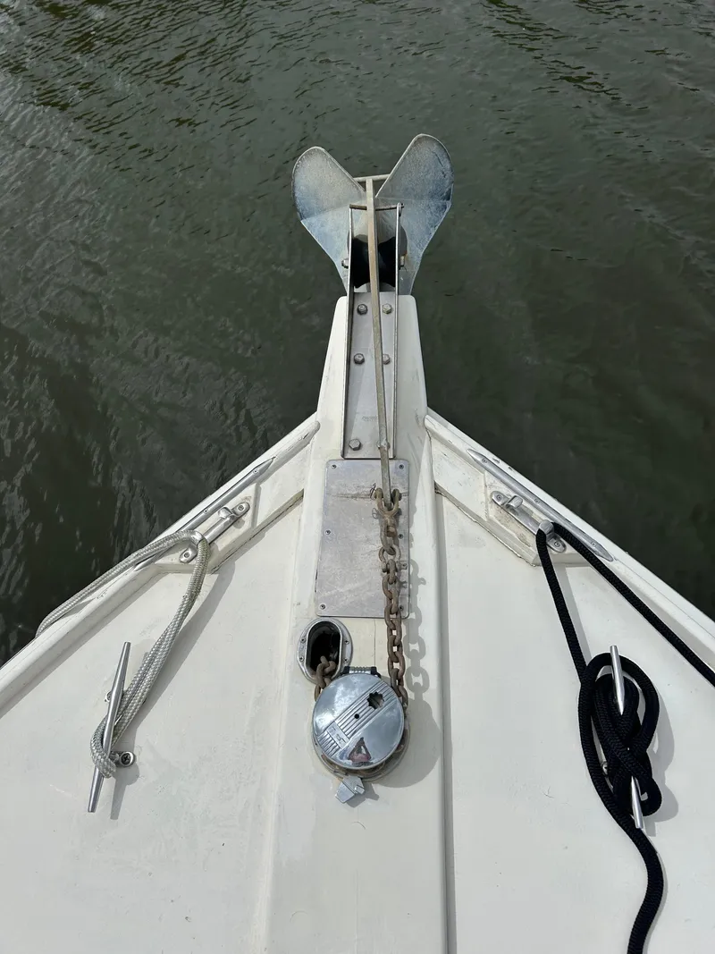 Slide: The Image of Bow of 1996 Mast & Mallet 34 Rabbit Custom boat with anchor and ropes. - 9