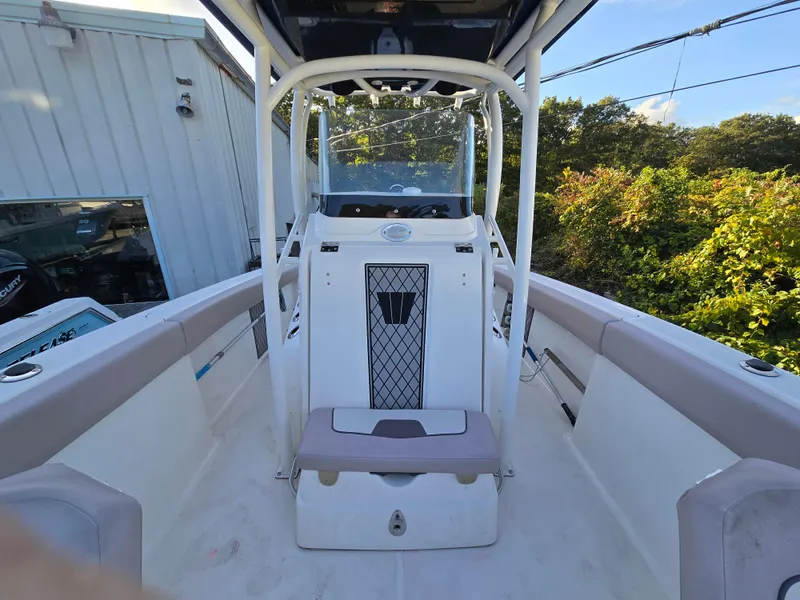 Slide: The Image of 2019 Wellcraft 242 Fisherman boat interior with console and seating. - 4