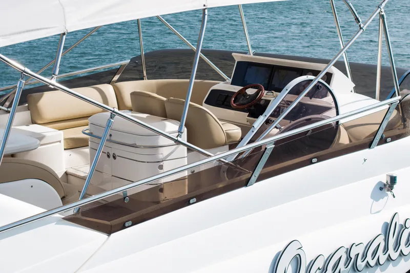 Slide: The Image of Luxury yacht interior of 2008 Viking Princess 75 with elegant seating and helm. - 13