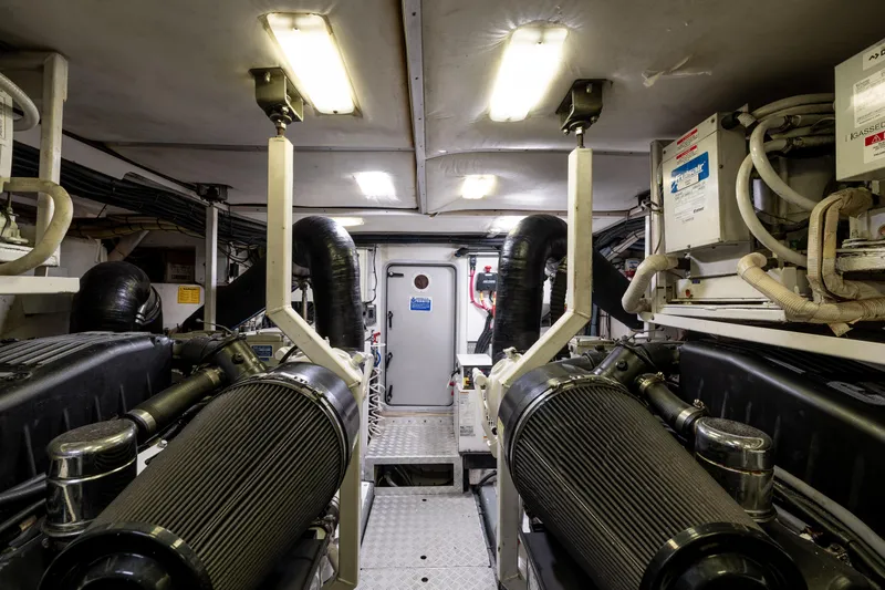 Slide: The Image of Engine room of 2008 Viking Princess 75 yacht, featuring machinery and equipment. - 18