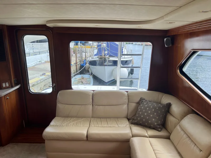 Slide: The Image of Luxurious interior of 2005 Rampage 45 Convertible yacht with leather seating. - 21