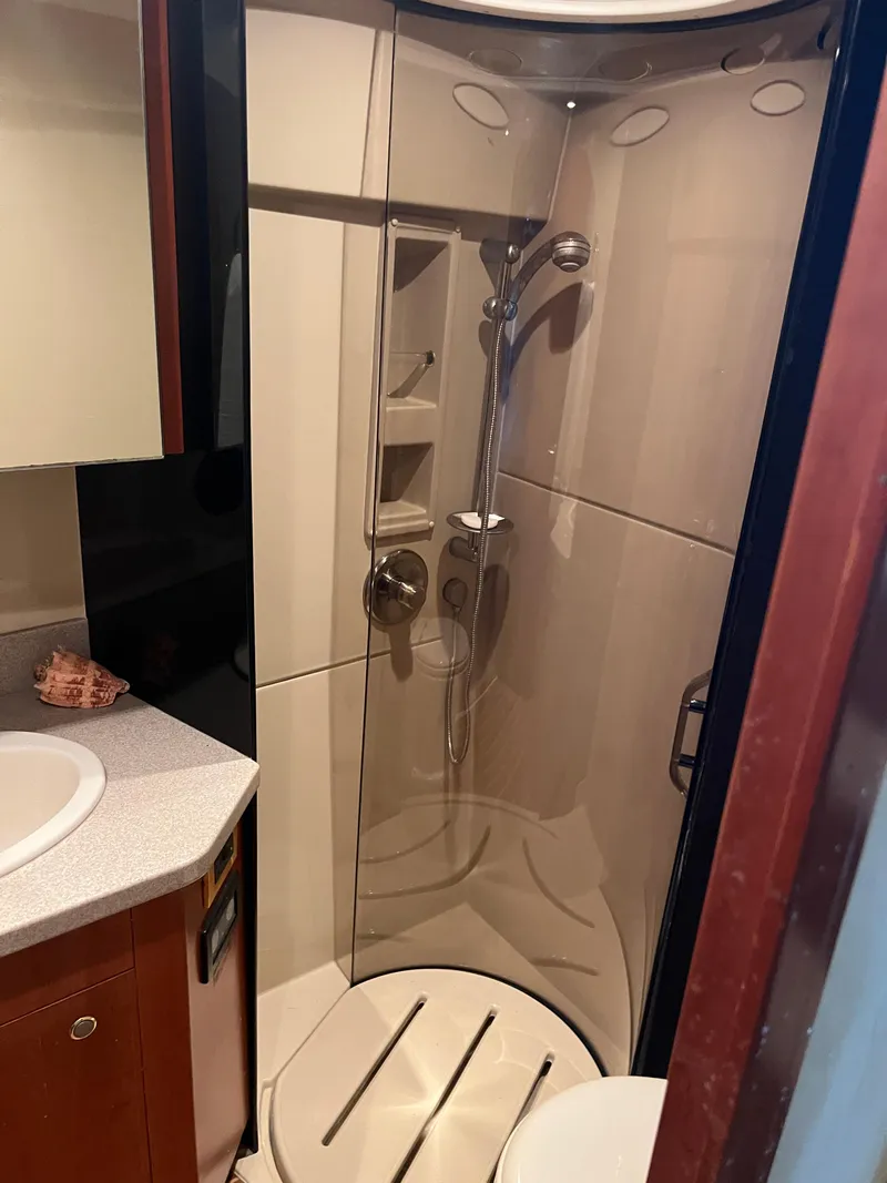 Slide: The Image of Compact shower in 2005 Rampage 45 Convertible yacht bathroom. - 34