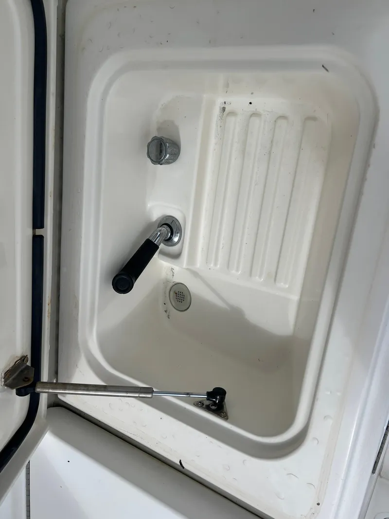 Slide: The Image of 2005 Rampage 45 Convertible boat sink with faucet and drain. - 40