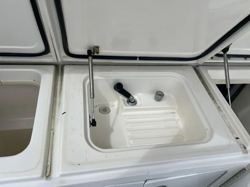 Slide: The Image of 2005 Rampage 45 Convertible boat sink with closed storage compartments. - 42