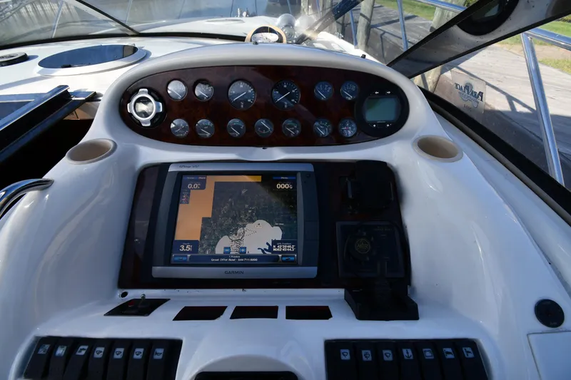 Slide: The Image of Control panel of 1997 Sunseeker Camargue 47 yacht with navigation display and gauges. - 20