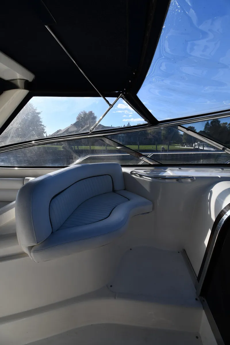 Slide: The Image of 1997 Sunseeker Camargue 47 interior with sleek seating and panoramic windows. - 27