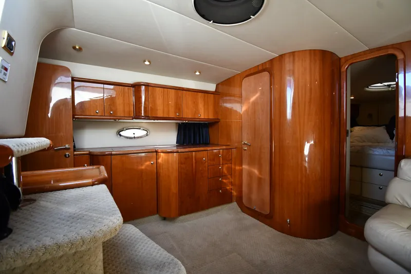 Slide: The Image of Luxurious interior of 1997 Sunseeker Camargue 47 yacht with polished wood finish. - 37