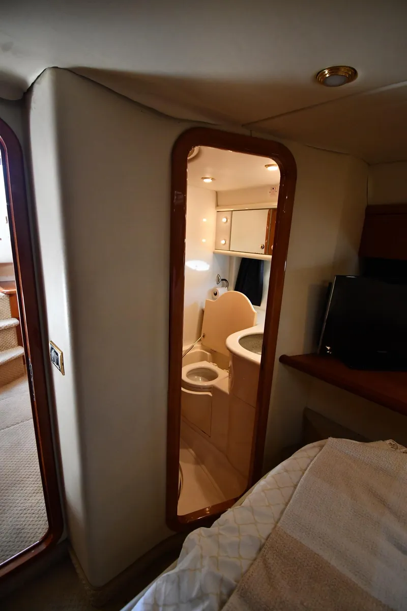 Slide: The Image of Interior view of 1997 Sunseeker Camargue 47 yacht cabin with bathroom. - 59