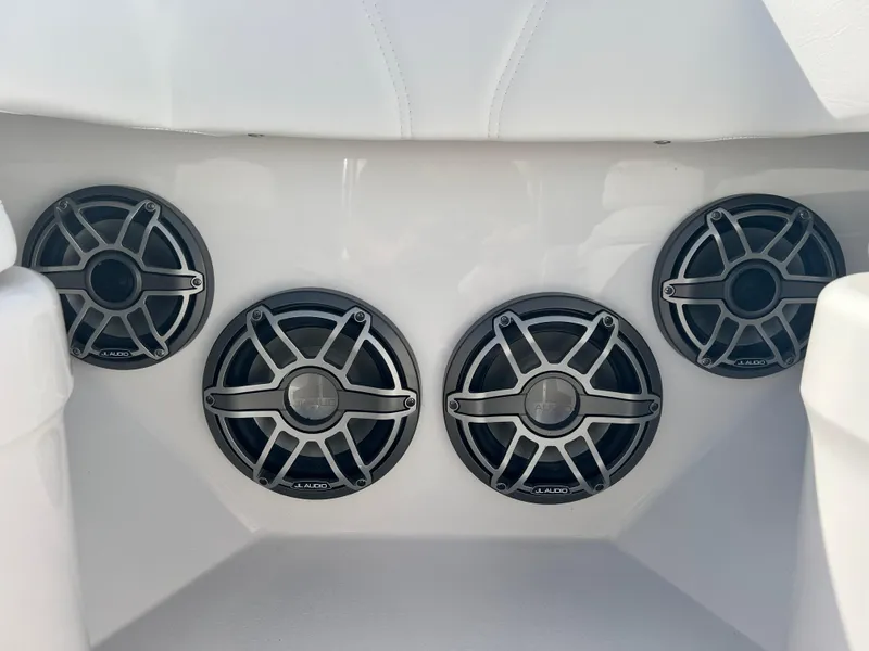 Slide: The Image of Four marine speakers on a 2025 Contender 30 ST boat. - 14