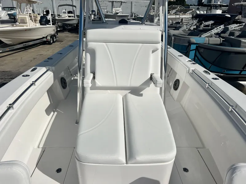 Slide: The Image of 2025 Contender 30 ST boat interior with white seating and sleek design. - 15
