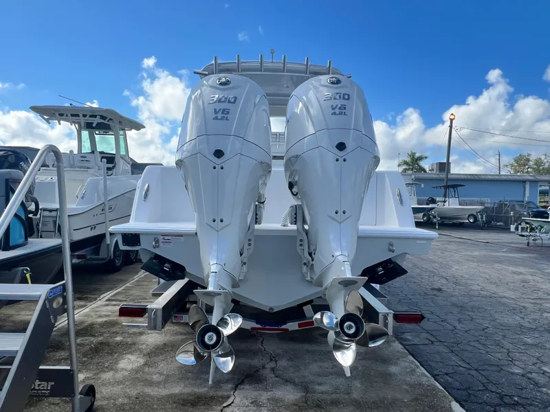Slide: The Image of 2025 Contender 30 ST boat with twin 300 V6 outboard engines. - 4