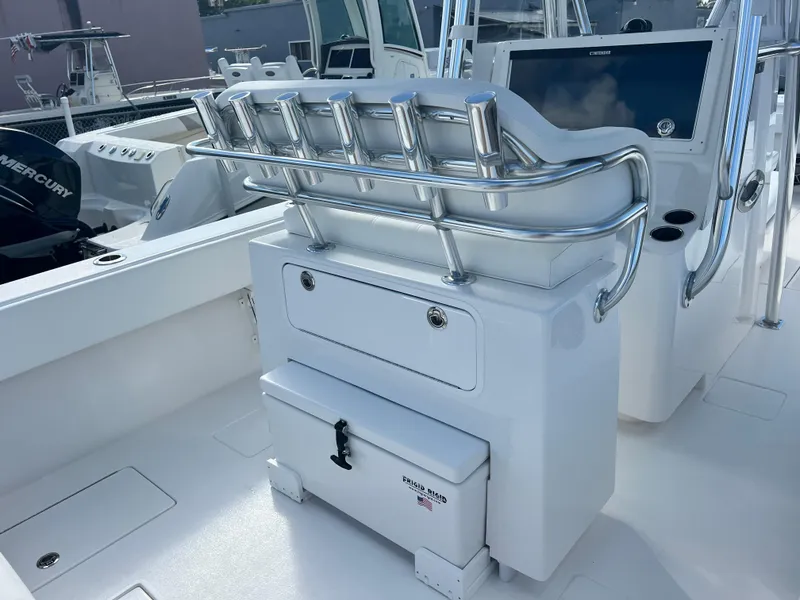 Slide: The Image of 2025 Contender 30 ST boat interior with seating and storage. - 9