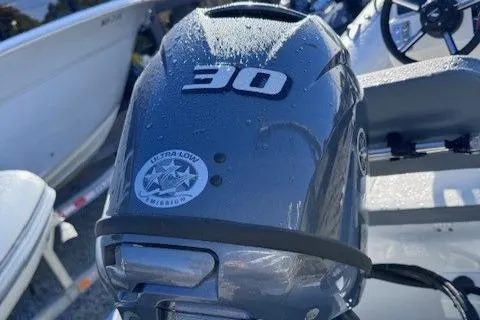 Slide: The Image of Steering console of 2025 Highfield Classic 380 GT boat, featuring modern controls. - 10