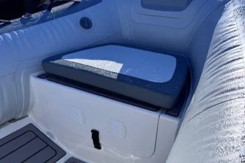 Slide: The Image of 2025 Highfield Classic 380 GT boat, white console, outdoor display. - 6