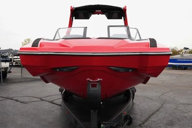 Slide: The Image of 2025 Supra SA 450 boat, vibrant red, front view on trailer. - 3