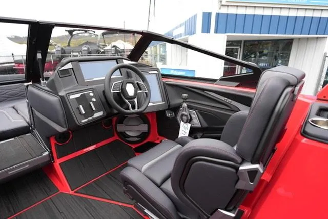 Slide: The Image of 2025 Supra SA 450 boat interior with modern dashboard and steering wheel. - 9
