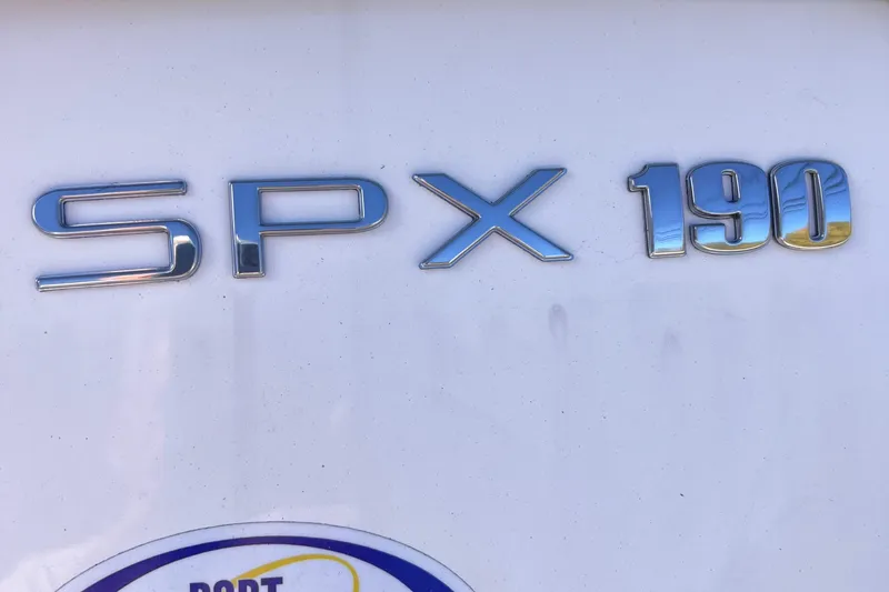 Slide: The Image of 2023 Sea Ray SPX 190 boat logo on white surface. - 21