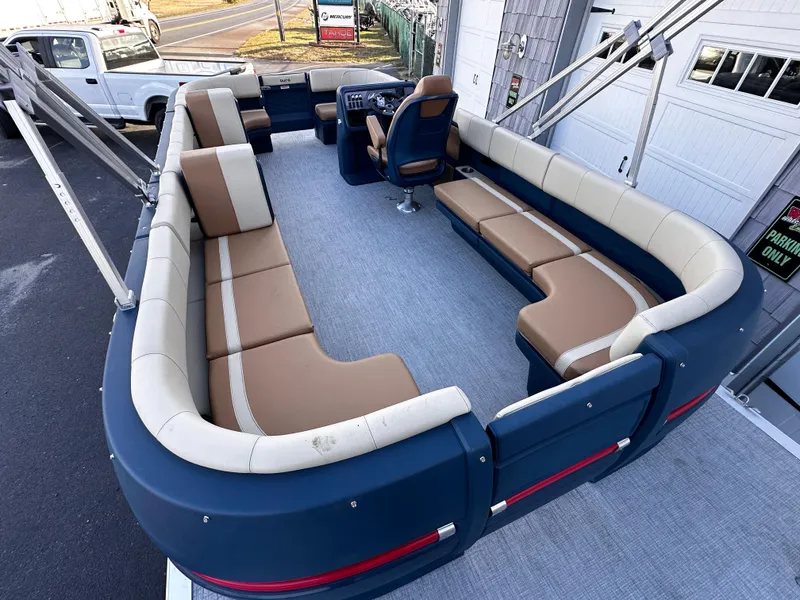 Slide: The Image of 2025 Avalon 2385 Aura Quad Lounge pontoon boat with spacious seating and modern design. - 10