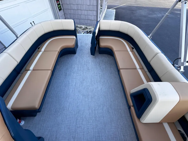 Slide: The Image of 2025 Avalon 2385 Aura Quad Lounge interior with spacious seating and modern design. - 19