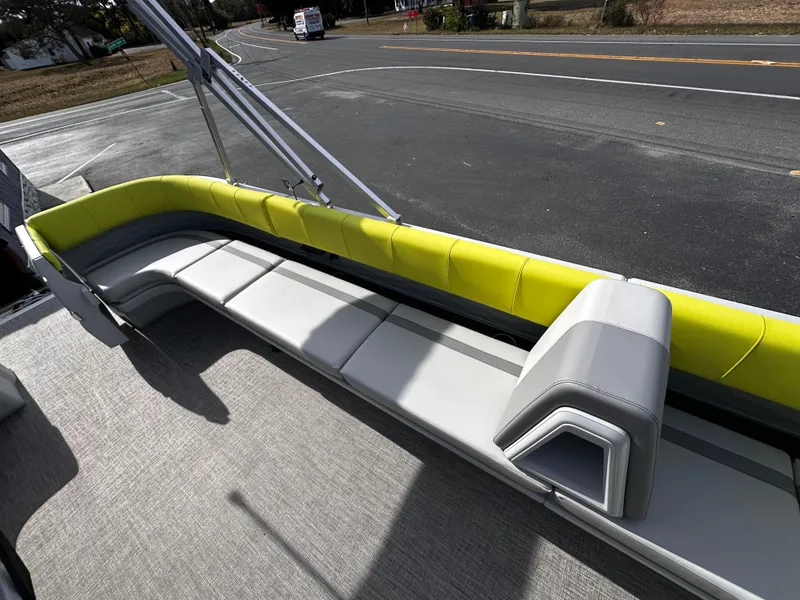 Slide: The Image of 2025 Avalon 2185 Aura Quad Lounge boat with sleek seating and modern design. - 16