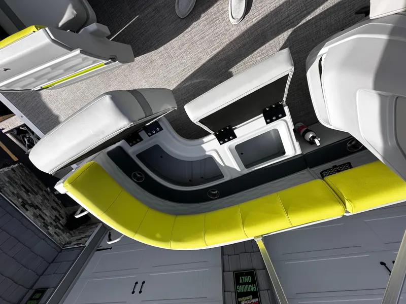 Slide: The Image of 2025 Avalon 2185 Aura Quad Lounge interior with modern seating and storage. - 24