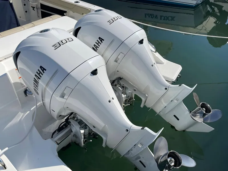 Slide: The Image of Twin Yamaha 300 outboard engines on a 2020 Pursuit S 288 boat. - 45
