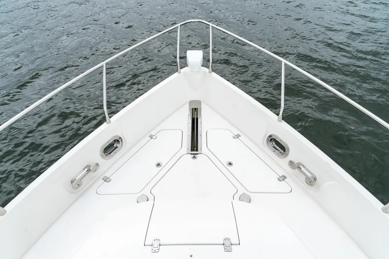 Slide: The Image of 2007 Marquis 59 Markham Edition yacht bow on water. - 27