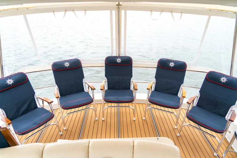 Slide: The Image of Luxury seating on 2007 Marquis 59 Markham Edition yacht deck. - 48