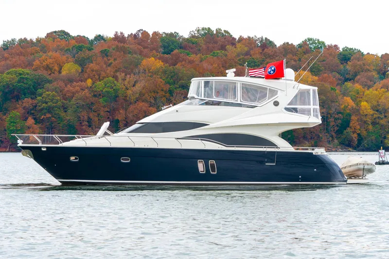 Slide: The Image of 2007 Marquis 59 Markham Edition yacht on a lake with autumn foliage. - 5