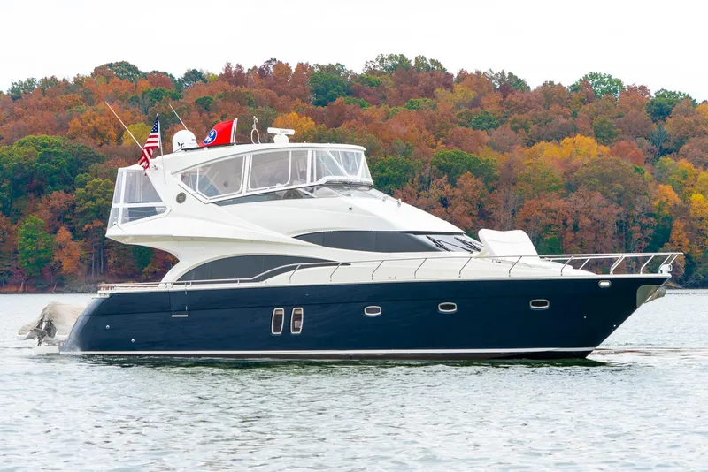 Slide: The Image of 2007 Marquis 59 Markham Edition yacht on a lake with autumn foliage. - 7