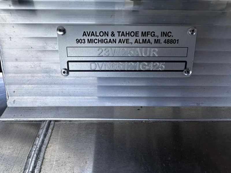 Slide: The Image of Metal identification plate on Avalon 2385 Aura Quad Lounge, Twin Toon, 2025 model. - 18