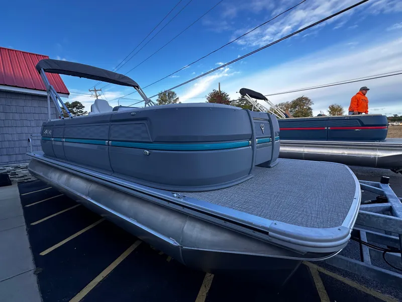 Slide: The Image of 2025 Avalon 2385 Aura Quad Lounge pontoon boat with sleek design and modern features. - 6