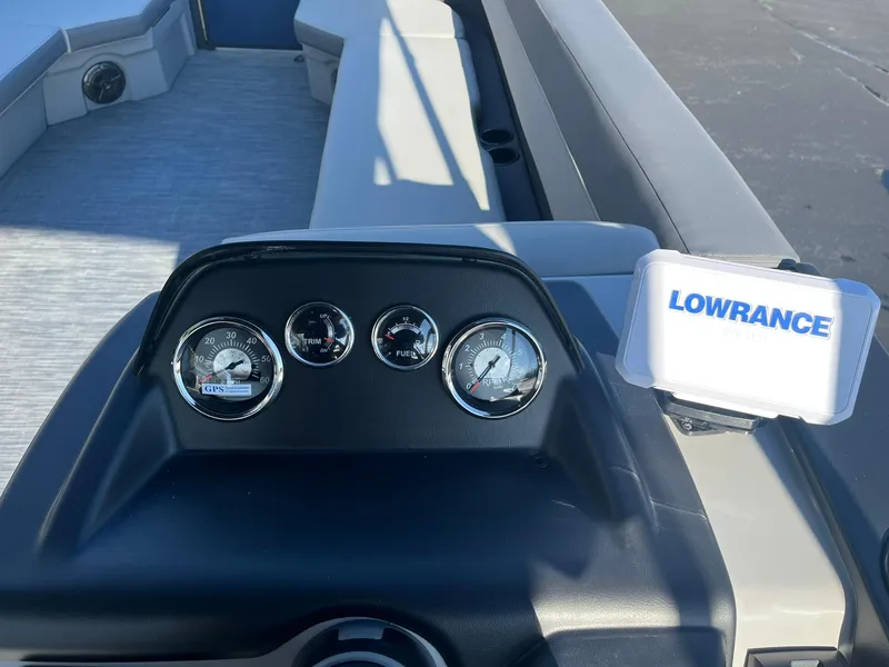 Slide: The Image of Dashboard of 2025 Lowe LS 230 WT boat with gauges and Lowrance display. - 11