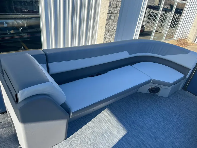 Slide: The Image of 2025 Lowe LS 230 WT boat interior with gray seating and modern design. - 21