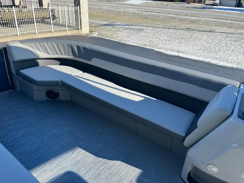 Slide: The Image of 2025 Lowe LS 230 WT boat interior with sleek gray seating and modern design. - 25