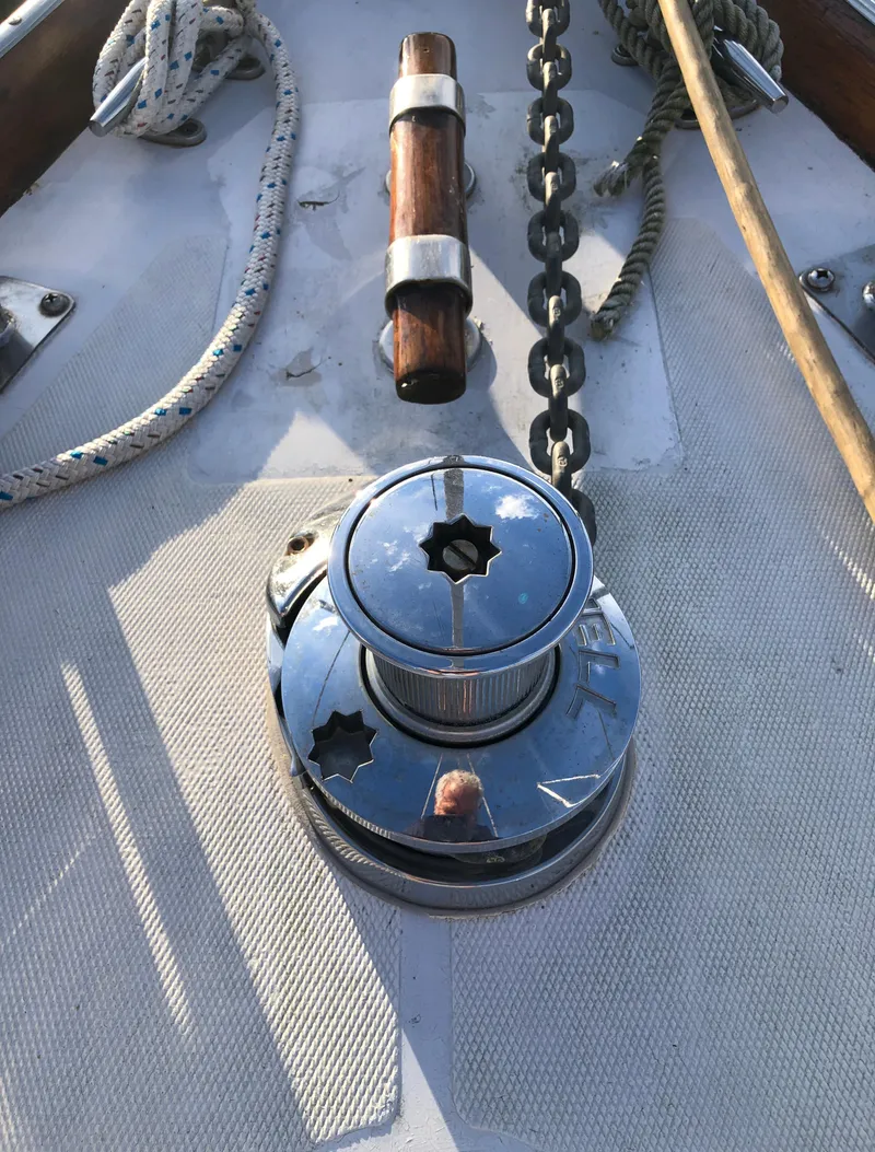 Slide: The Image of 1968 LeComte Northeast 38 sailboat deck with winch and chain detail. - 17