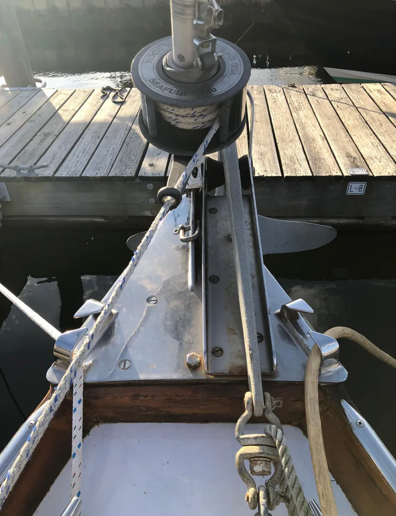 Slide: The Image of Bow of 1968 LeComte Northeast 38 sailboat with winch and ropes at dock. - 18