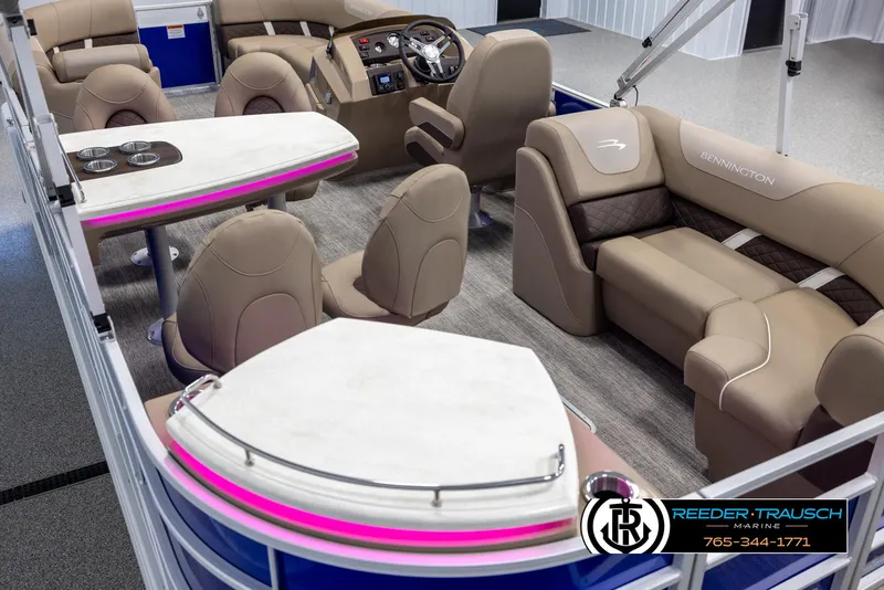 Slide: The Image of 2025 Bennington 23 SXPDSE pontoon boat interior with luxurious seating and modern design. - 11