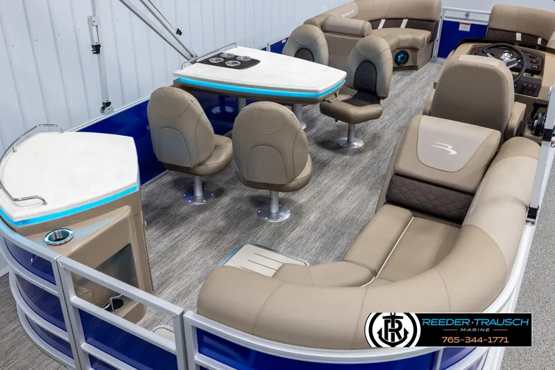 Slide: The Image of 2025 Bennington 23 SXPDSE pontoon boat interior with luxurious seating and modern design. - 12